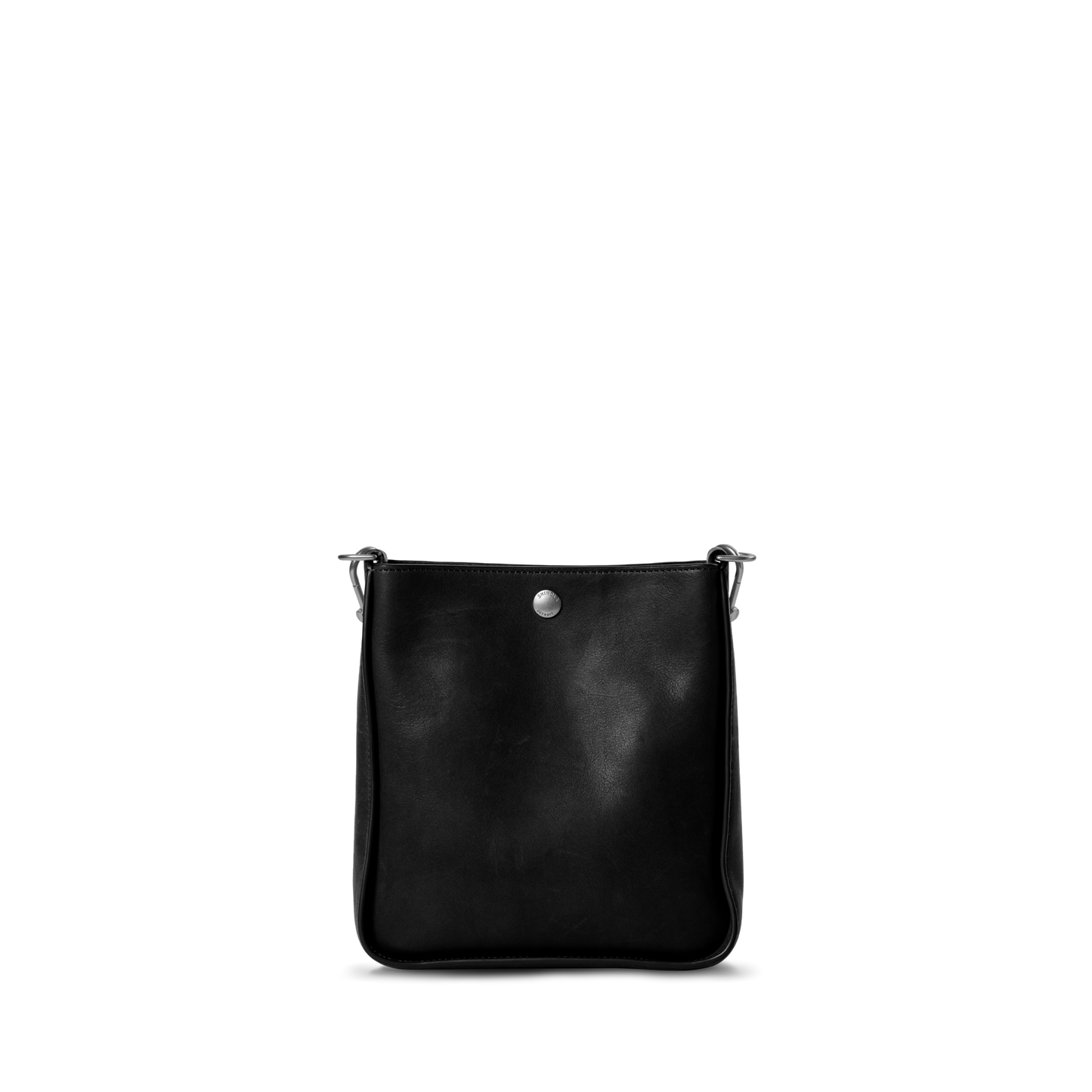 The Shinola Mini Pocket Crossbody Bag - Black features a minimalist rectangular design with black leather, a single silver button top closure, and an adjustable strap, shown against a plain white background.