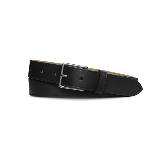 The Shinola 1 1/4" Dress Belt in black natural leather features a silver rectangular buckle, displayed rolled up on a white background.