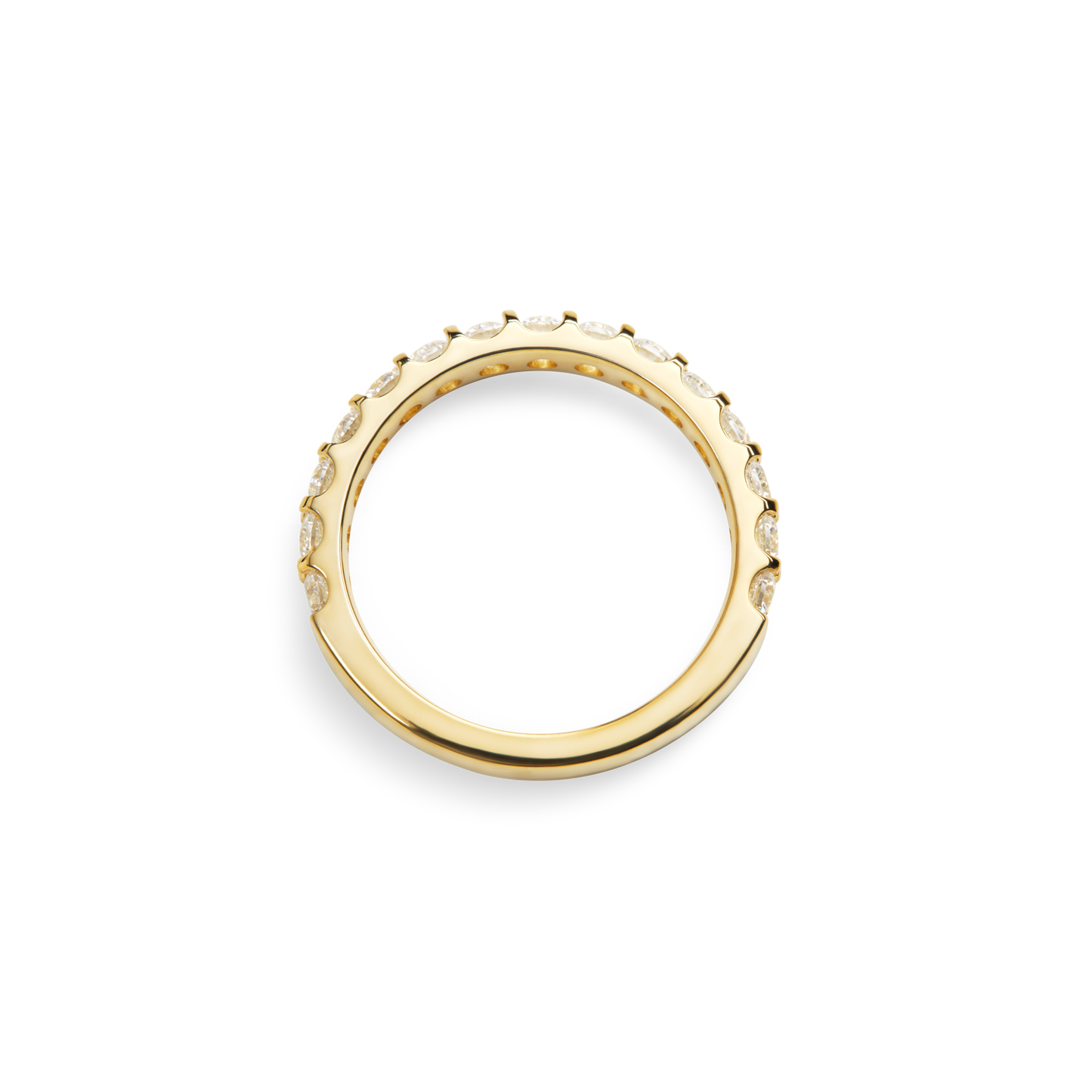 The Shinola 1 Carat Diamond Anniversary Band in yellow gold features small natural diamonds set along the top half of the band, displayed from a side angle against a white background.