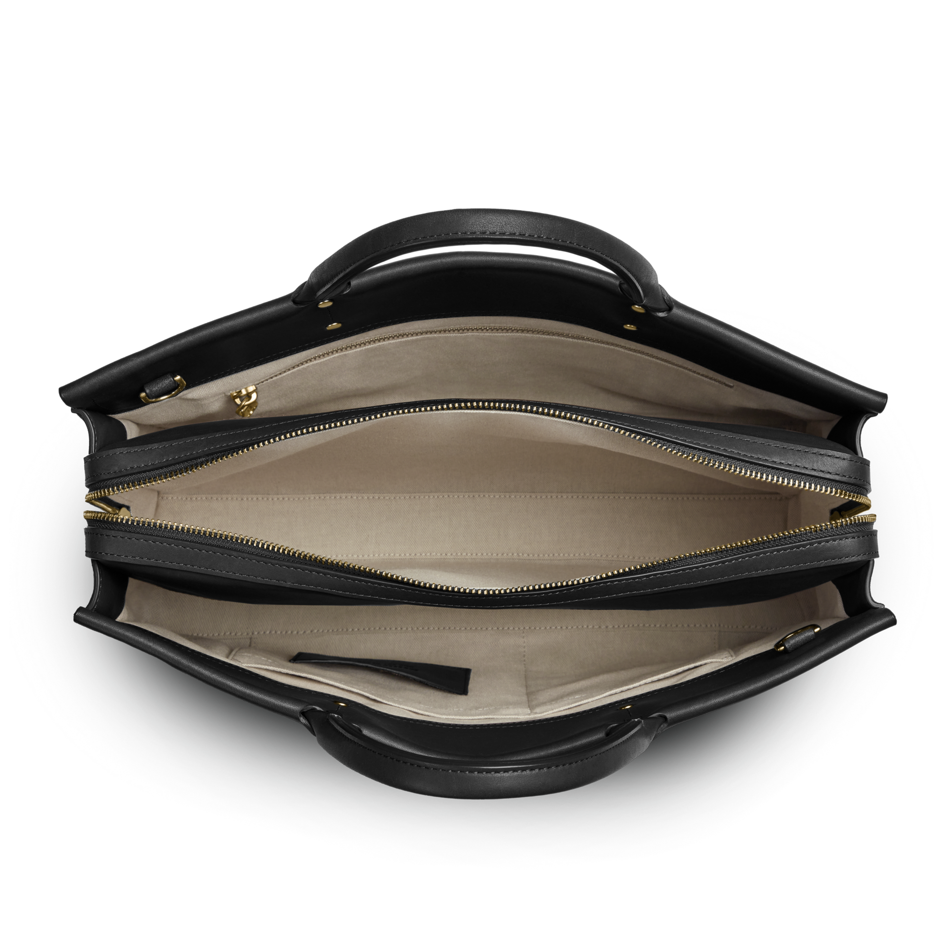 Top view of the Shinola Day Satchel - Black, featuring beige lining, two zippered compartments, and multiple open pockets for organization—ideal for on-the-go use.