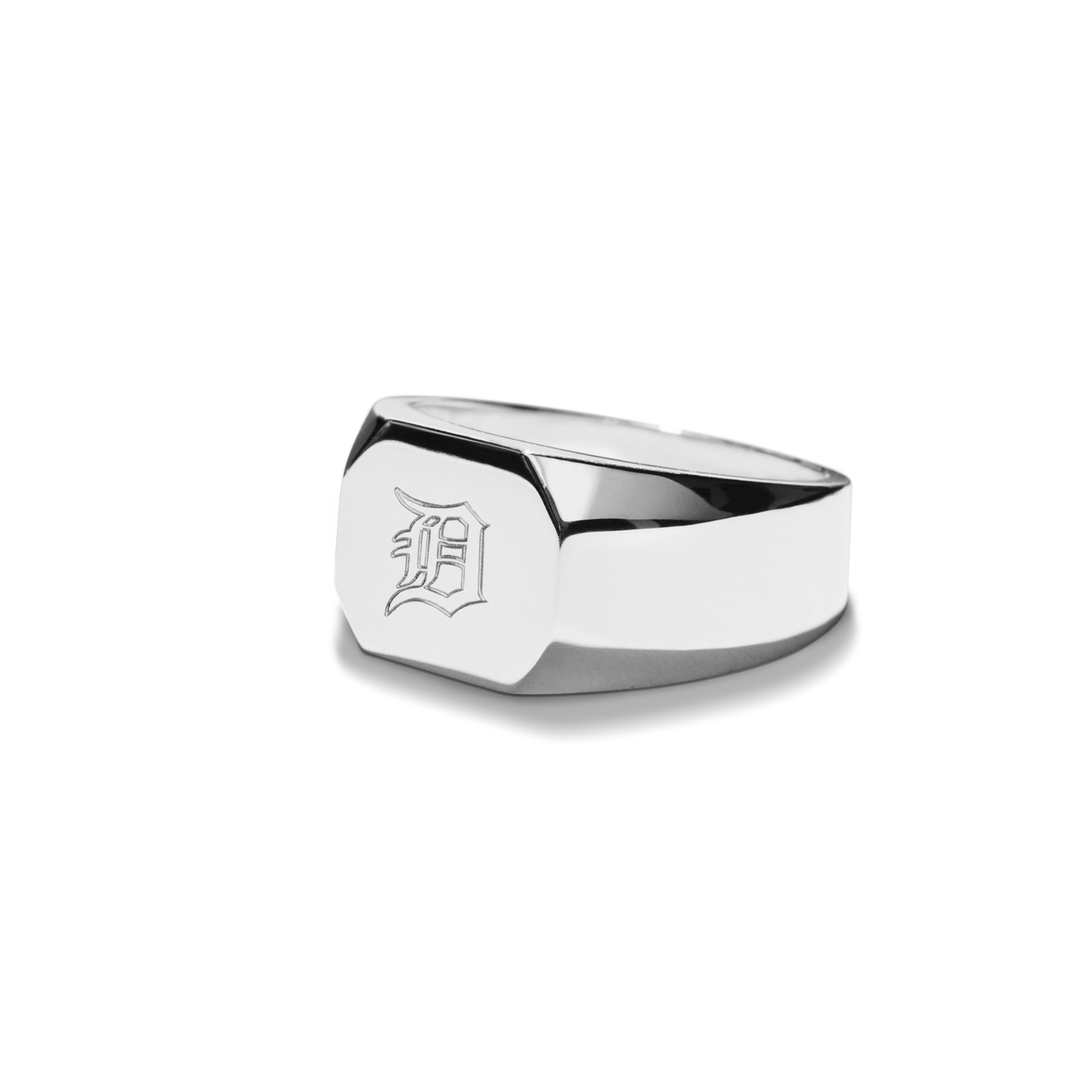 The Shinola Octagonal Signet Ring in sterling silver features a minimalist flat top engraved with an ornate letter D, shown on a white background.