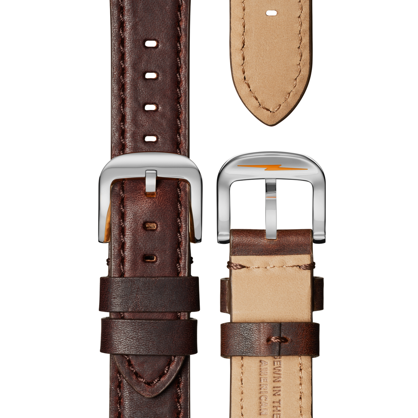 Close-up of two Shinola Canfield Chronograph Watch Cattail leather straps, one facing up and one down, showing dark brown exteriors, light beige interiors, stitched edges, shiny silver buckles, and elegant top loaded case construction.