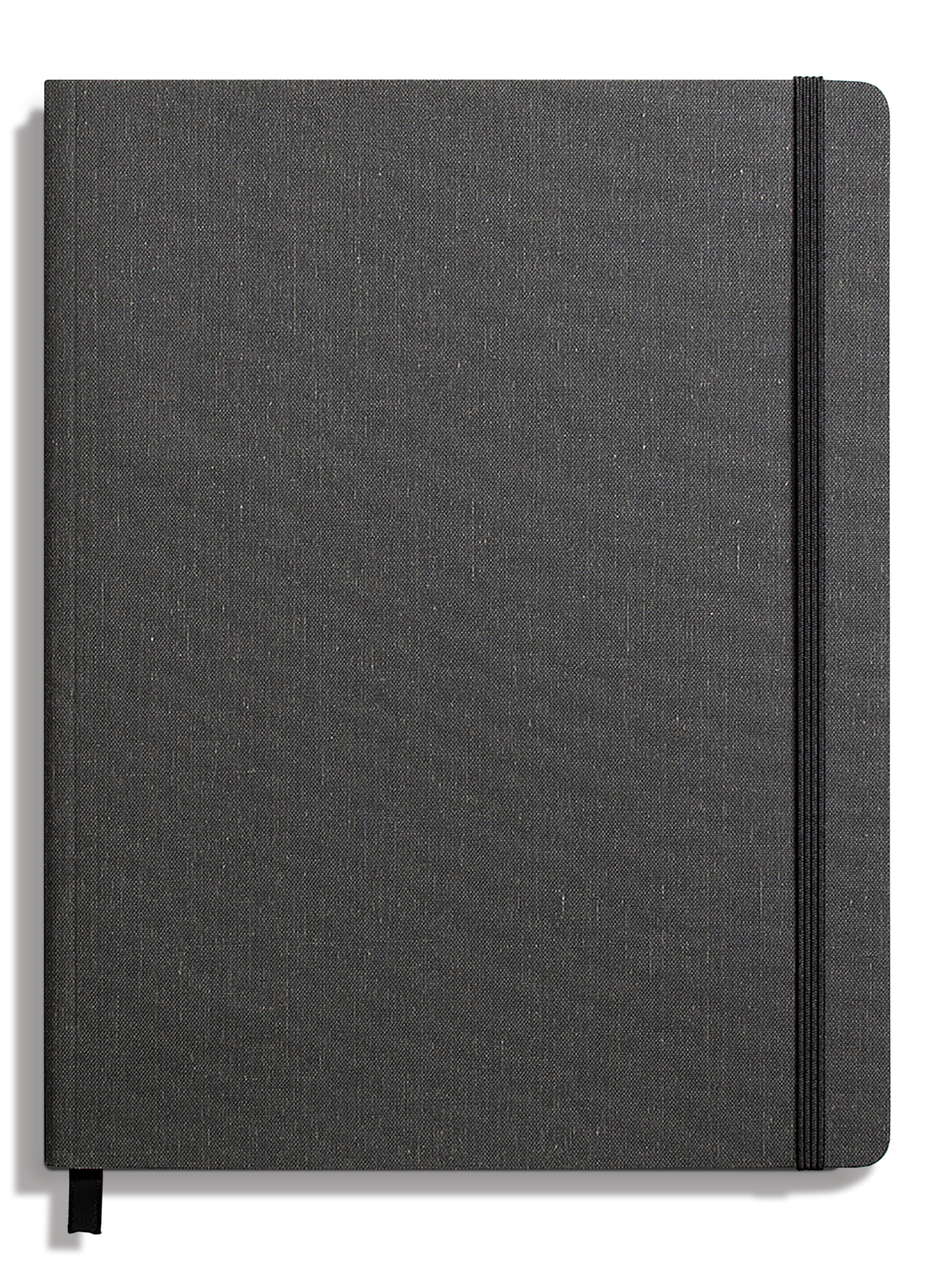 The Shinola Large Soft Ruled Journal in Charcoal features a textured fabric cover, smyth-sewn binding for durability, a black elastic closure on the right side, and a black ribbon bookmark at the bottom.
