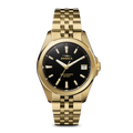 The Shinola Circadian Monster Automatic Watch in gold features a black dial, gold hour markers and hands, a date window at 3 o’clock, and a bold gold bracelet. The watch face reads "Shinola Automatic Detroit.