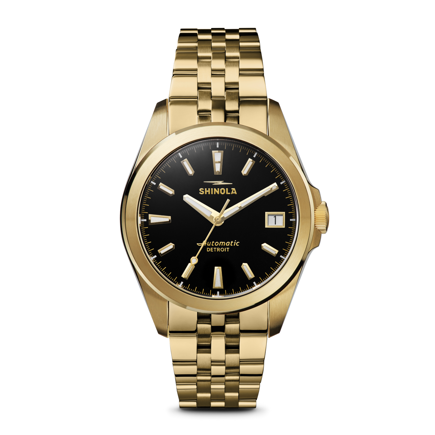 The Shinola Circadian Monster Automatic Watch in gold features a black dial, gold hour markers and hands, a date window at 3 o’clock, and a bold gold bracelet. The watch face reads "Shinola Automatic Detroit.