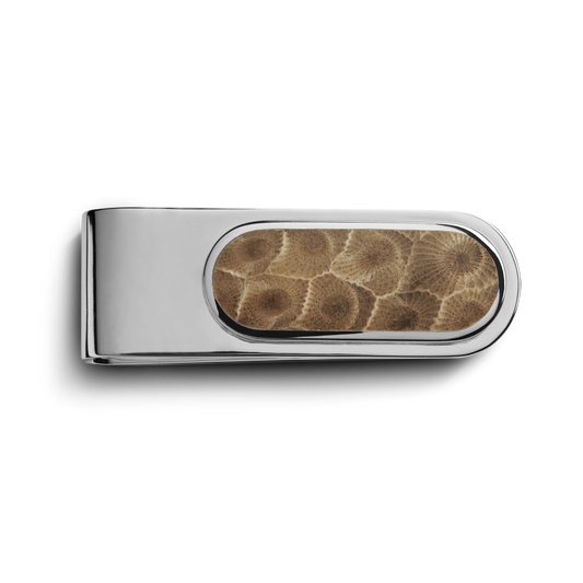 The Shinola Petoskey Money Clip - Sterling Silver features an oval inset with a textured brown Petoskey stone pattern, set against a plain white background.