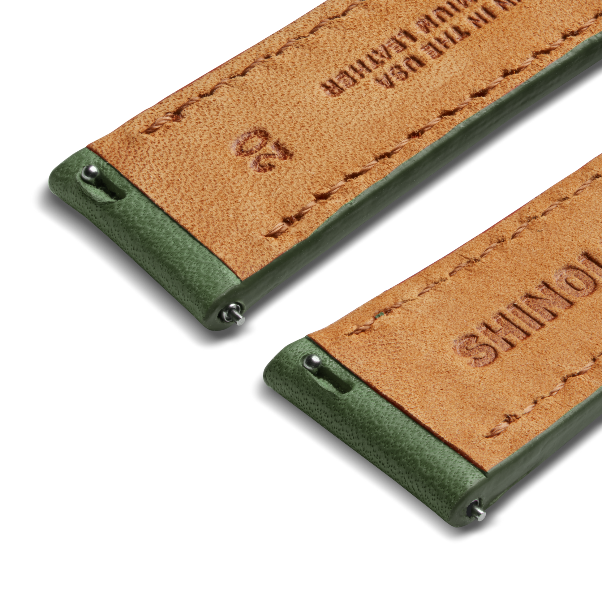 Close-up of two Shinola 20mm Green Leather Watch Straps with green edges, visible stitching, metal spring bars, and embossed leather—ideal for your Runwell Automatic or Omaha watch.