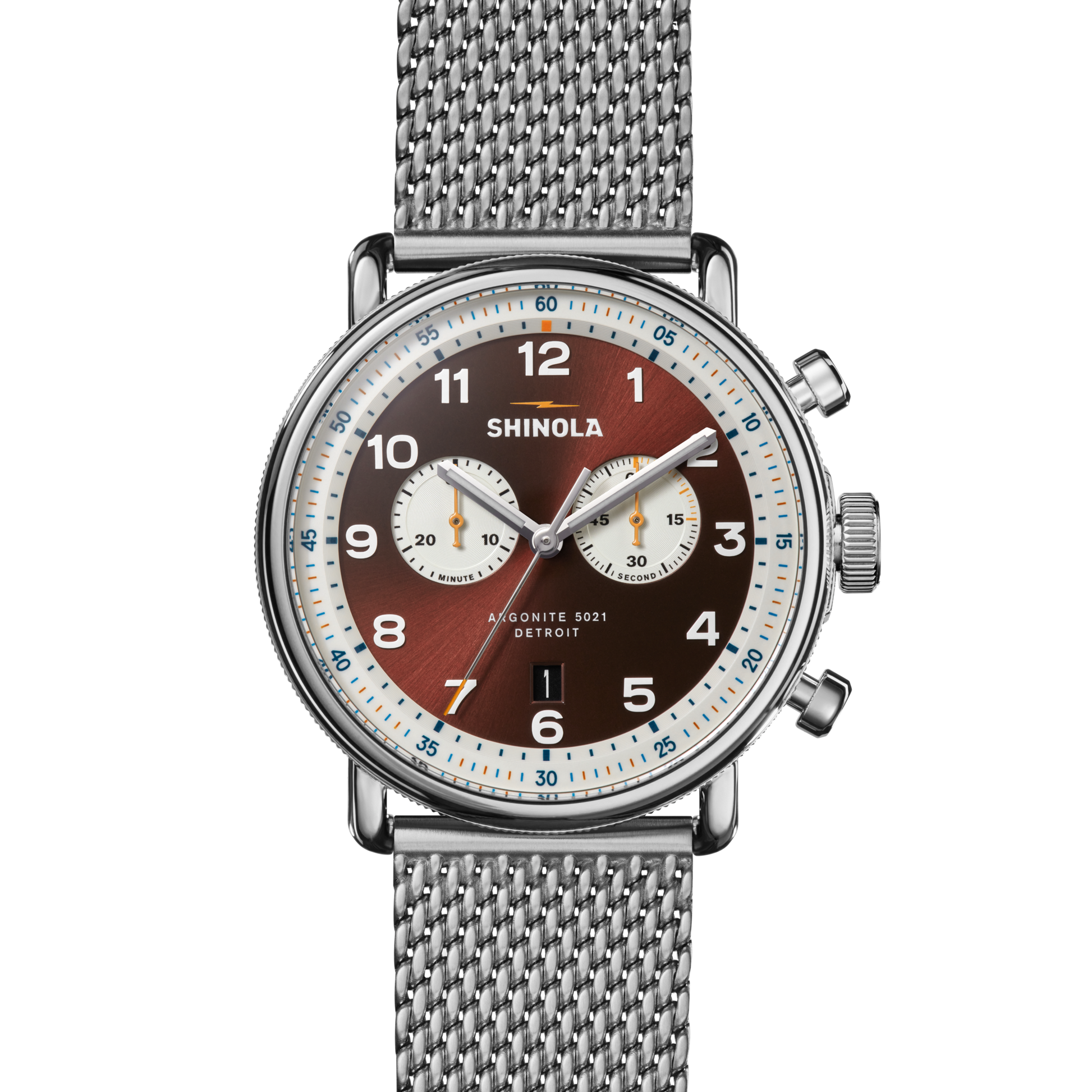 The Shinola Canfield C56 Chronograph Watch - Whiskey features a stainless steel mesh bracelet, brown dial with two white subdials and numerals, and “Shinola” plus “Argonite 5021 Detroit” on the face for a mid-century modern style.