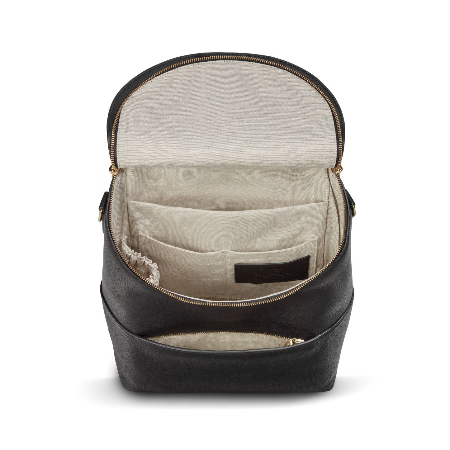 The Shinola Convertible Pocket Backpack - Brand Stripe / Black features a spacious beige fabric-lined interior with multiple pockets for organization—perfect as a hands-free companion for daily adventures.