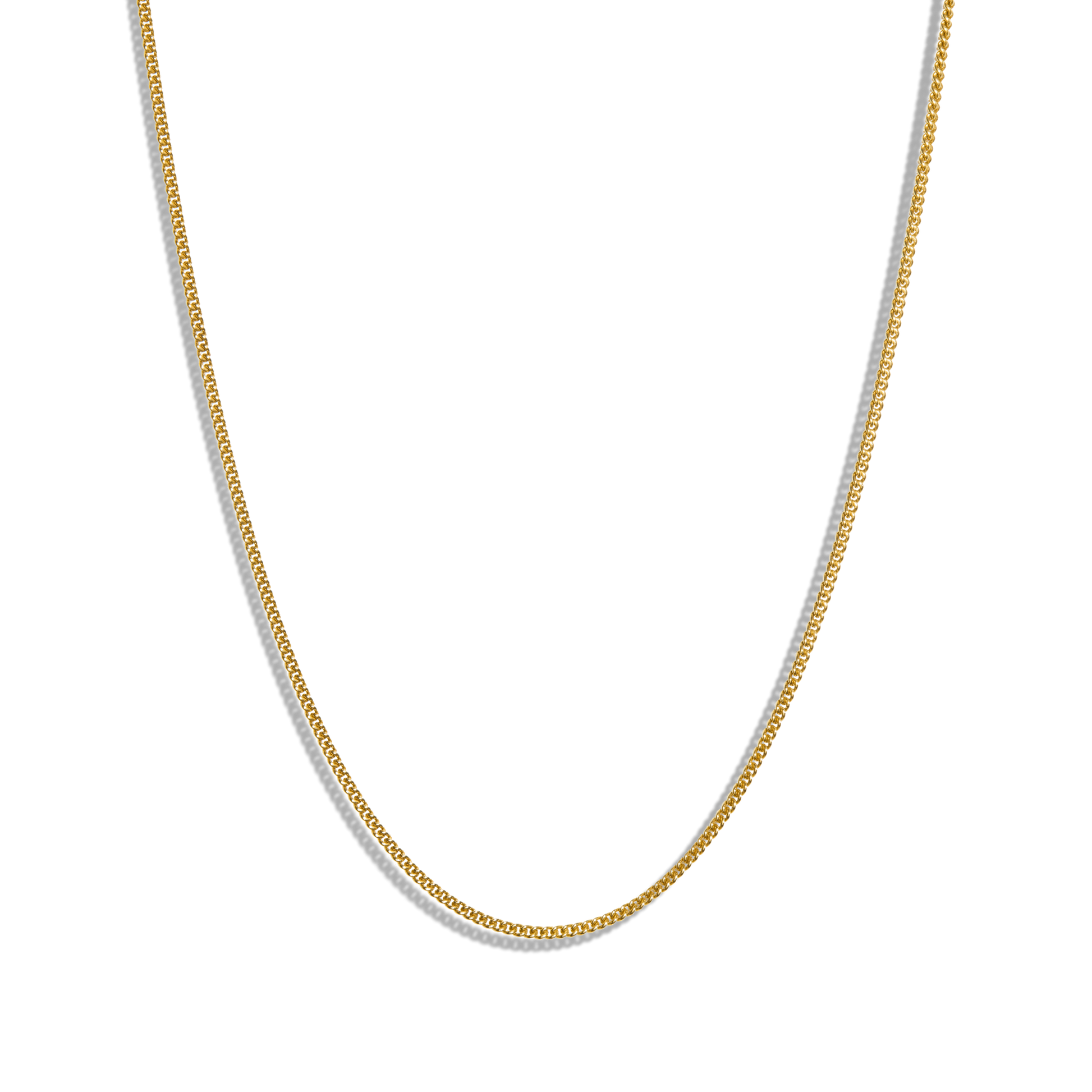The Shinola Small Curb Link - Yellow Gold necklace is shown curved against a plain white background. This adjustable piece adds timeless elegance, making it a versatile accessory for any occasion.