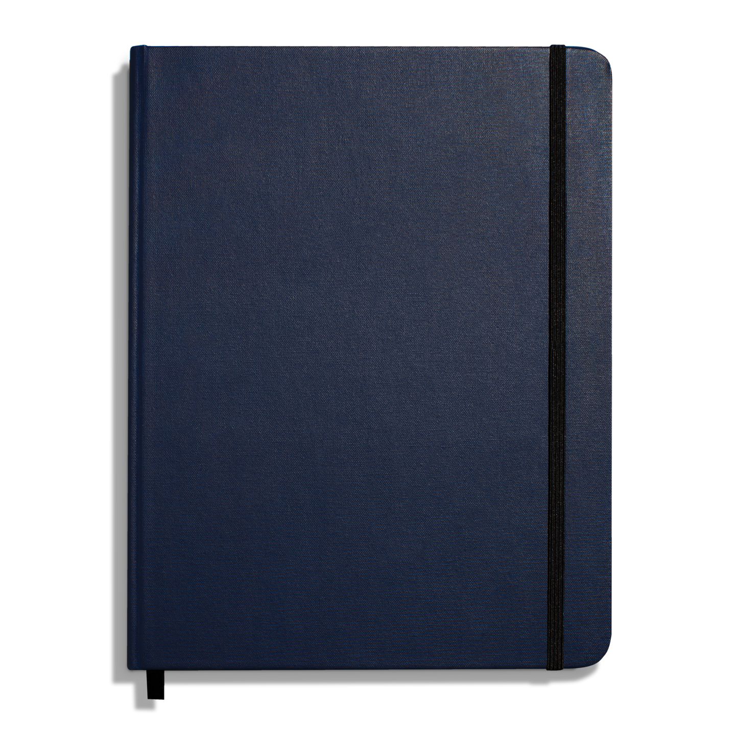 The Shinola Large Hard Ruled Journal in Navy features a closed hard linen cover, a black elastic band along the right edge, and a black ribbon bookmark visible at the bottom.