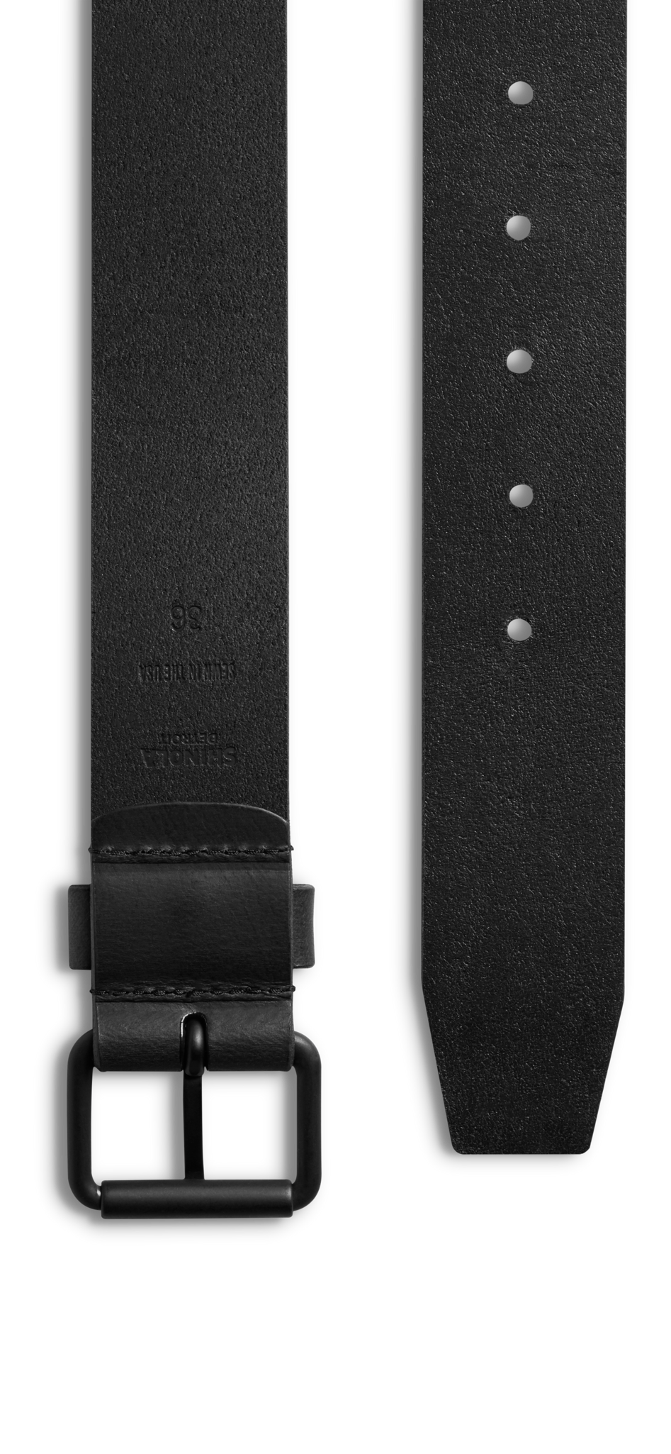 A close-up of the Shinola 1 1/2" Rambler Belt - Black, handcrafted from Bridle leather with a matte black buckle and multiple adjustment holes, shown against a white background.