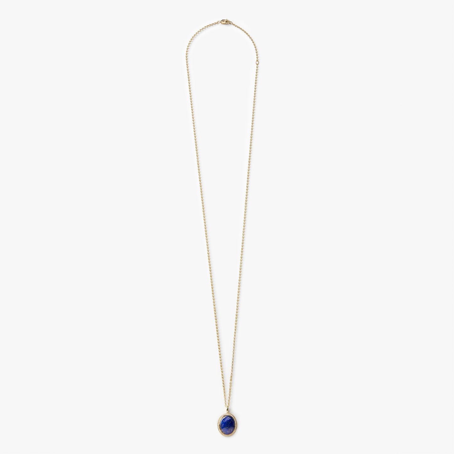 The Shinola Diamond Pave Lapis Pendant Necklace in yellow gold features a delicate chain and a small, oval-shaped blue lapis pendant with diamond accents, shown against a plain white background.
