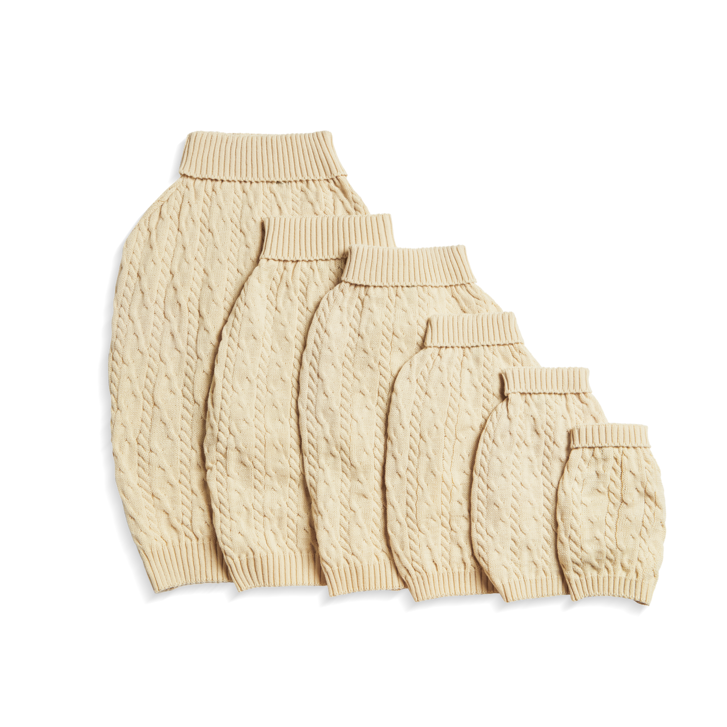 Five Shinola Cable Knit Dog Sweater - Ivory are displayed in descending sizes, overlapping on a white background.