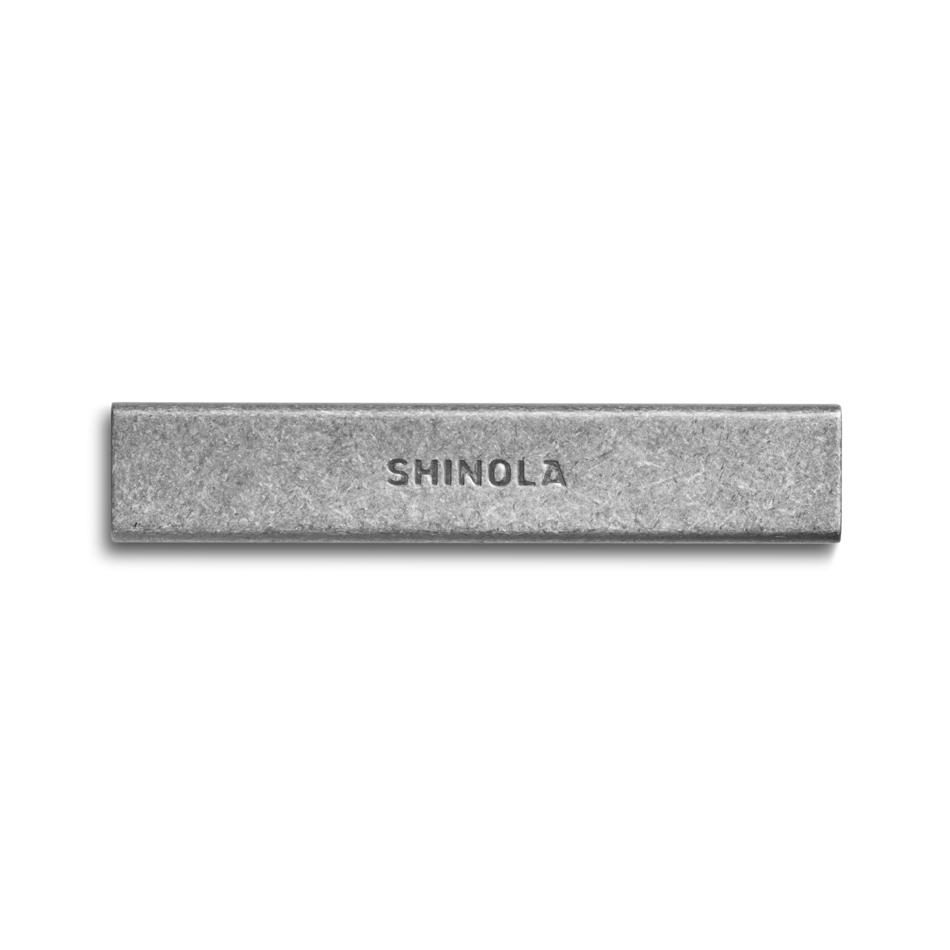 The Shinola Aluminum Matchbox Set features a rectangular gray aluminum design with "SHINOLA" engraved in the center, shown against a plain white background.
