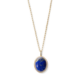 The Shinola Diamond Pave Lapis Pendant Necklace in 14k yellow gold showcases an oval deep blue lapis gemstone framed by sparkling clear stones—a striking accessory set against a white background.