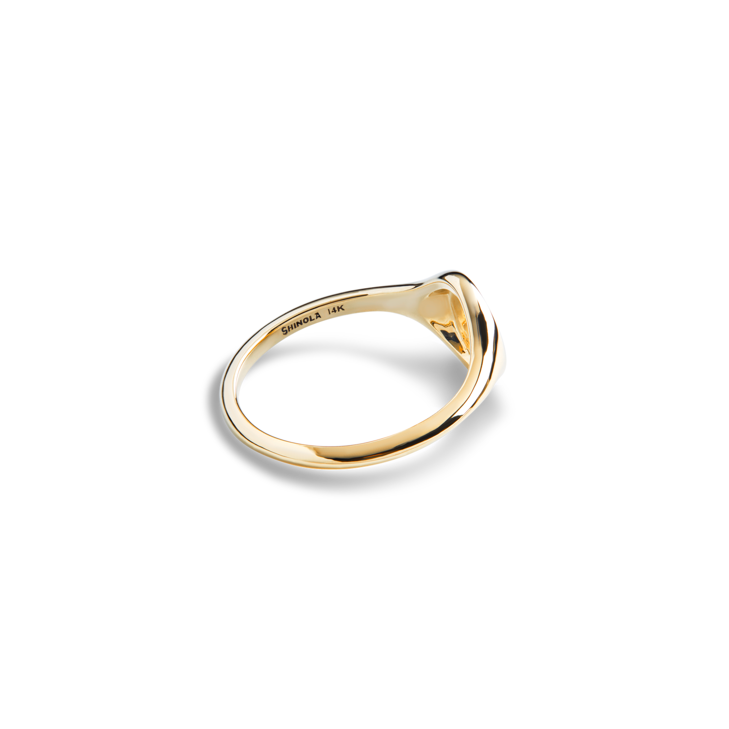 The Shinola Petite Round Signet Ring in 14k yellow gold features a sleek, polished design that exudes timeless elegance, shown against a plain white background.