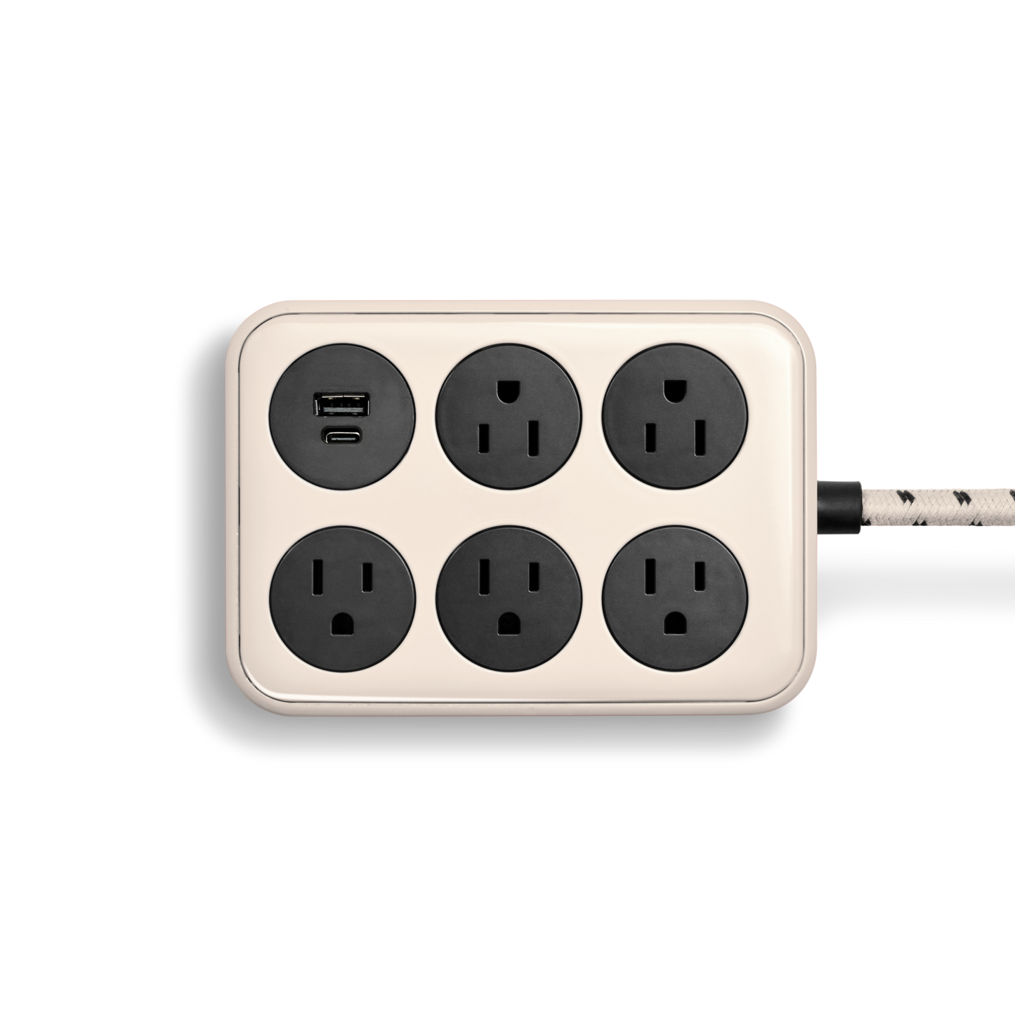 The Shinola 5 Port Power Supply in cream features a rectangular design with five black outlets, USB A and C charging ports, and a braided extension cord, shown against a plain white background.