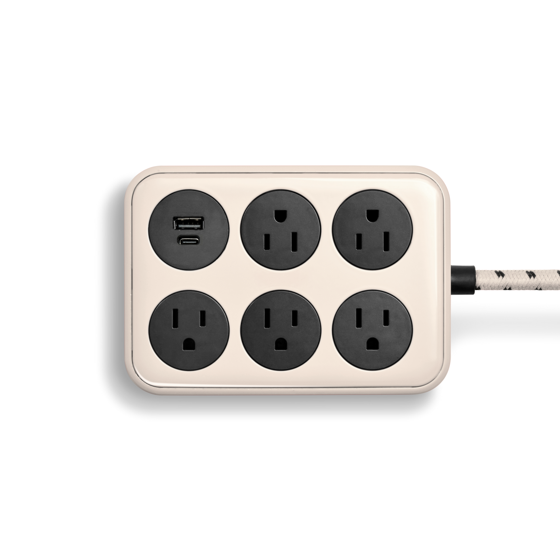 The Shinola 5 Port Power Supply in cream features a rectangular design with five black outlets, USB A and C charging ports, and a braided extension cord, shown against a plain white background.