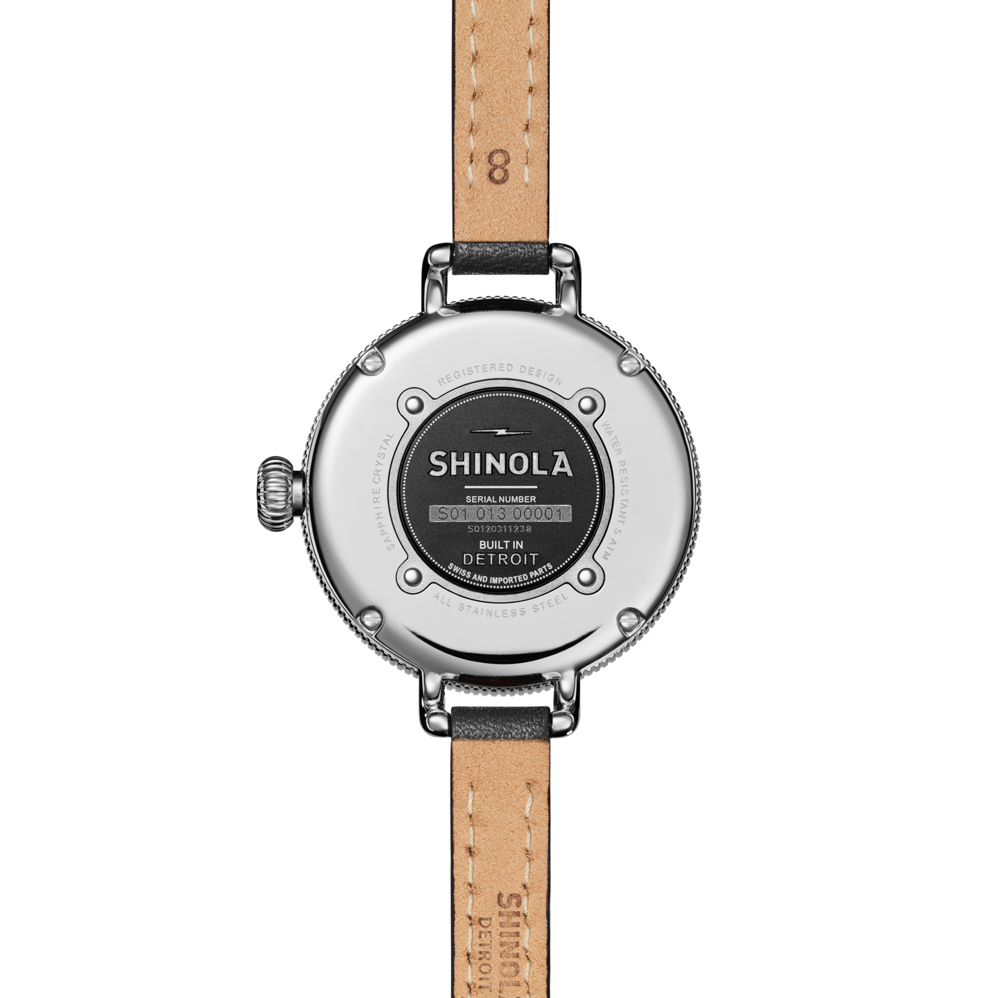 Back view of the Shinola Birdy Watch - Chrysocolla with a tan leather strap, showing engraved brand name, Detroit origin details, and serial number on its stainless steel case.