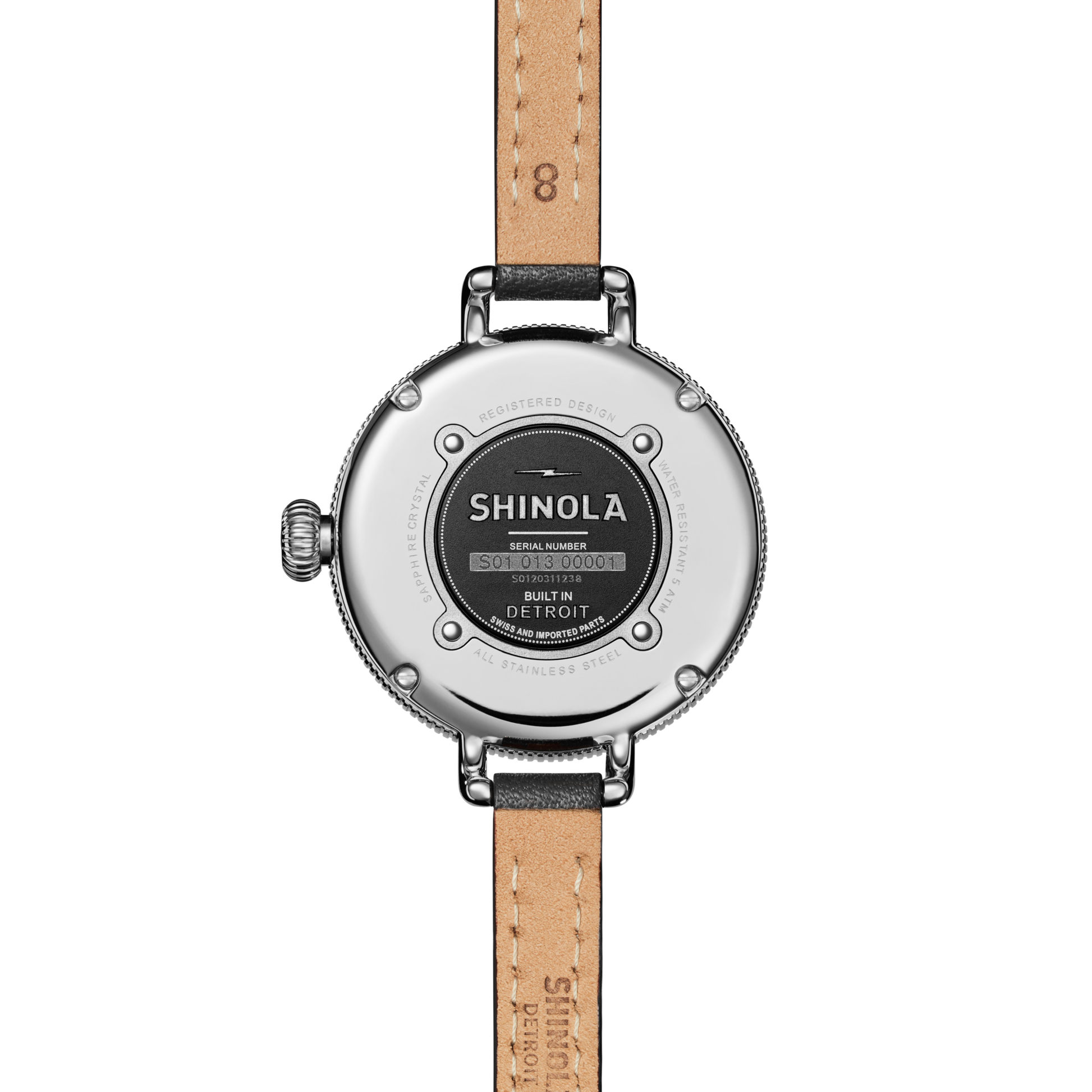 Back view of the Shinola Birdy Watch - Chrysocolla with a tan leather strap, showing engraved brand name, Detroit origin details, and serial number on its stainless steel case.