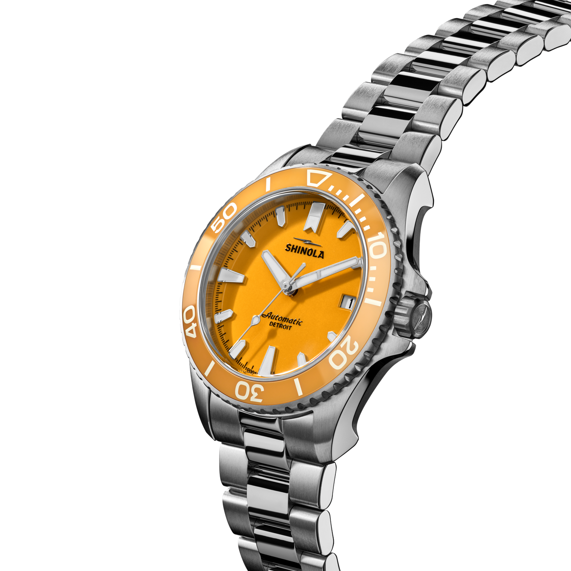 The Shinola Lake Huron Monster Automatic Dive Watch features a stainless steel case, silver metal band, orange bezel and dial with white hour markers, and silver hands with white accents—showcasing Shinola’s signature style.