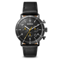 The Shinola Canfield Sport Chronograph Watch features a black leather strap, gunmetal stainless steel case, black dial with white numerals and yellow hands, plus subdials and the brand name on its face.