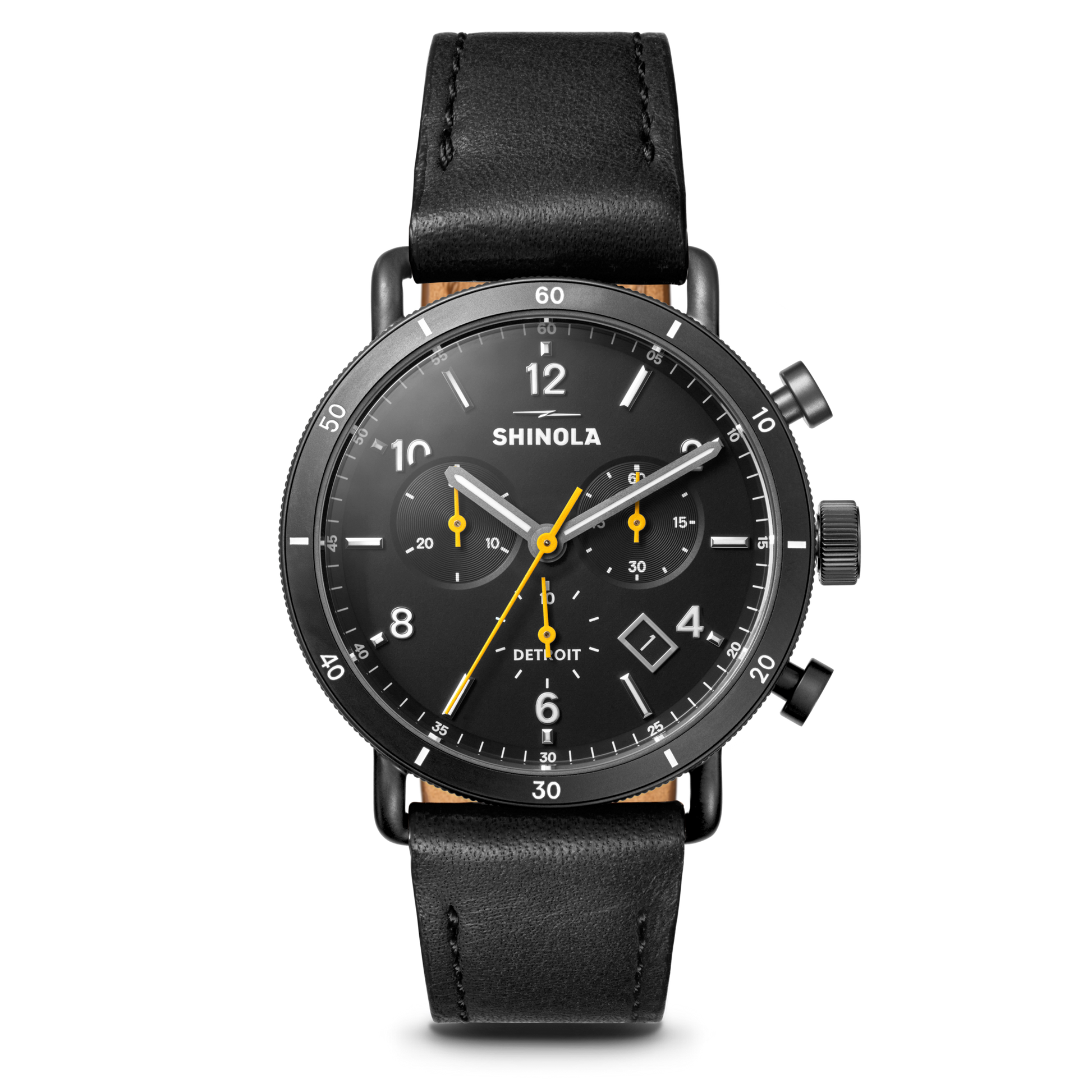 The Shinola Canfield Sport Chronograph Watch features a black leather strap, gunmetal stainless steel case, black dial with white numerals and yellow hands, plus subdials and the brand name on its face.