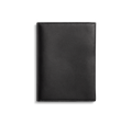The Shinola Passport Holder - Black is a closed, rectangular Italian Vachetta leather accessory with clean edges and visible stitching, shown against a plain white background for an elegant travel look.