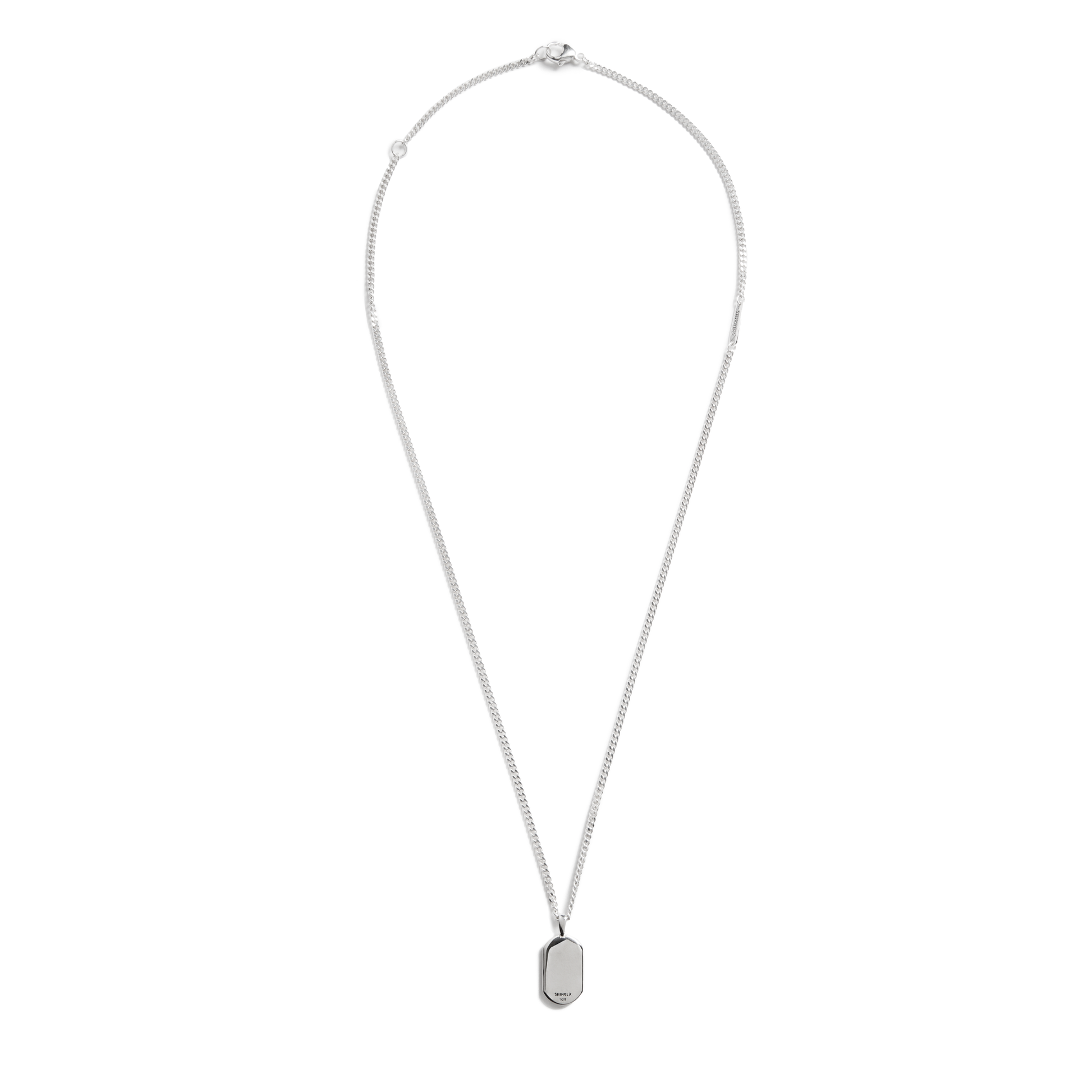 The Shinola Turquoise Inlay Tag Necklace features a thin sterling silver chain and a small rectangular pendant with turquoise inlay, displayed on a plain white background.