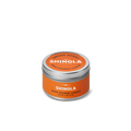 A small orange tin labeled "Shinola Hand Poured 4oz Travel Candle - Smoke," crafted from coconut soy wax with a silver lid and white text, sits on a white background—reflecting Detroit’s signature style.