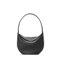 The Shinola Small Shoulder Bag - Black is a classic hobo style crafted from natural grain leather with a wide strap, rounded base, and subtle stitching, displayed upright against a plain white background.