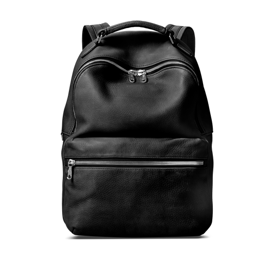 The Shinola Runwell Backpack - Black is a premium black leather backpack with a top handle, large main zippered pocket, and smaller front zip compartment, shown on a plain white background.