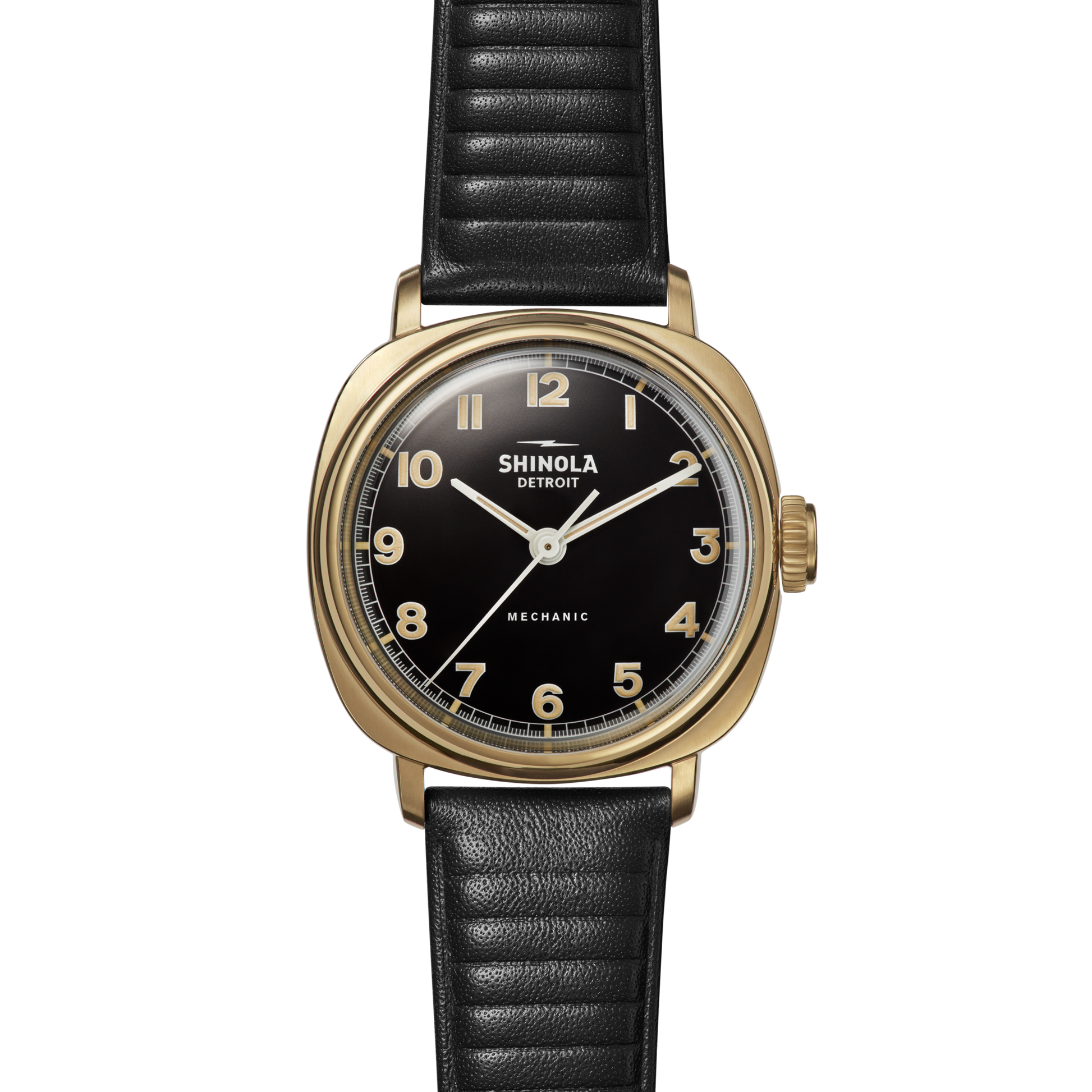 The Shinola Mechanic Watch - Black/Gold features a gold-tone case, black dial with gold numerals, and a black leather strap, displayed against a white background. The watch shows the time as approximately 1:52.