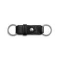 The Shinola Leather Valet Key Fob - Black features two metal key rings at each end and a central snap button, shown against a plain white background.