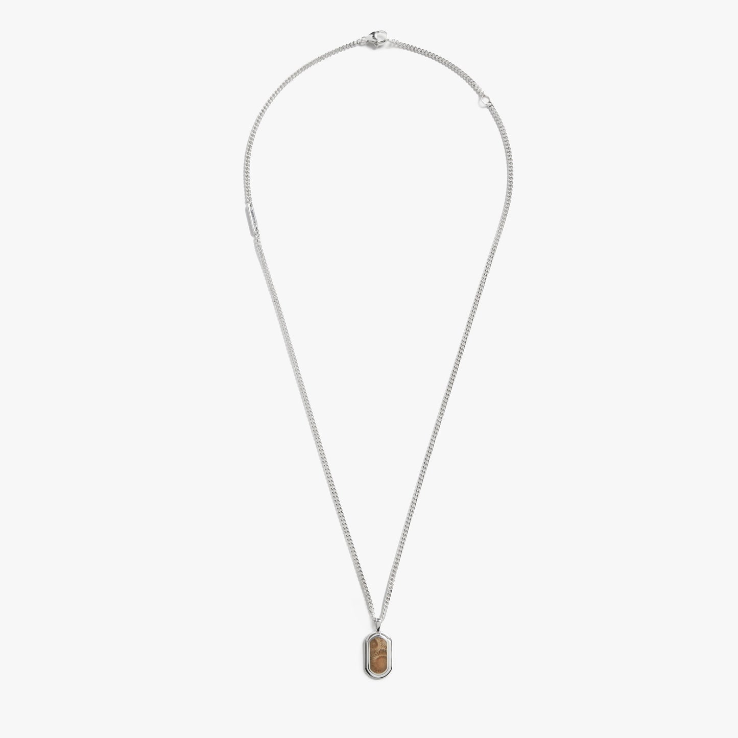 The Shinola Petoskey Tag Necklace features a rectangular brown marbled Petoskey stone pendant in sterling silver, offering unique gemstone jewelry against a plain white background.
