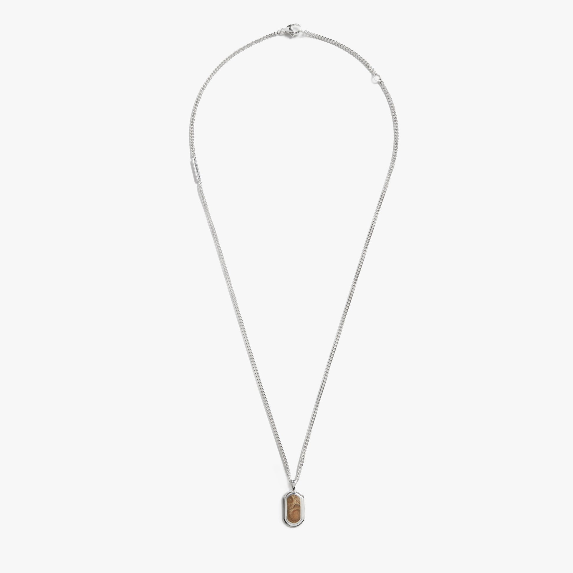 The Shinola Petoskey Tag Necklace features a rectangular brown marbled Petoskey stone pendant in sterling silver, offering unique gemstone jewelry against a plain white background.