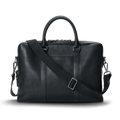 A shinola.momputer Briefcase in black, featuring dual top handles, a detachable shoulder strap, and subtle stitching details, set against a plain white background.