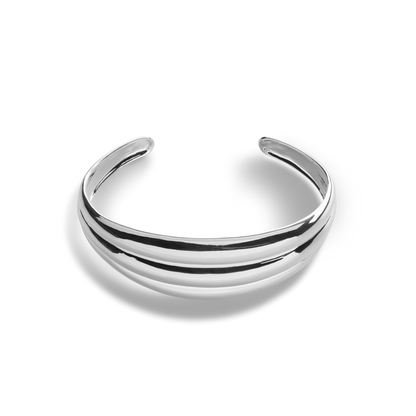 The Signature Silver Statement Cuff by Shinola features polished sterling silver with a smooth, gently curved design and open back, shown against a white background.