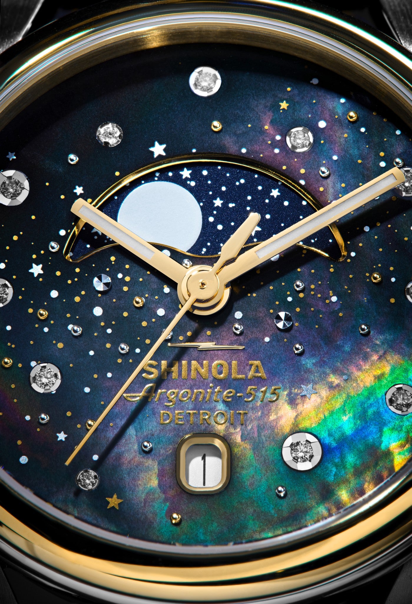 Close-up of the Shinola Celestial Derby Watch - Black Mother of Pearl Diamond, highlighting gold hands, a moon and stars motif, diamond accents on the black mother-of-pearl dial, and a celestial window date display at 6 o'clock.