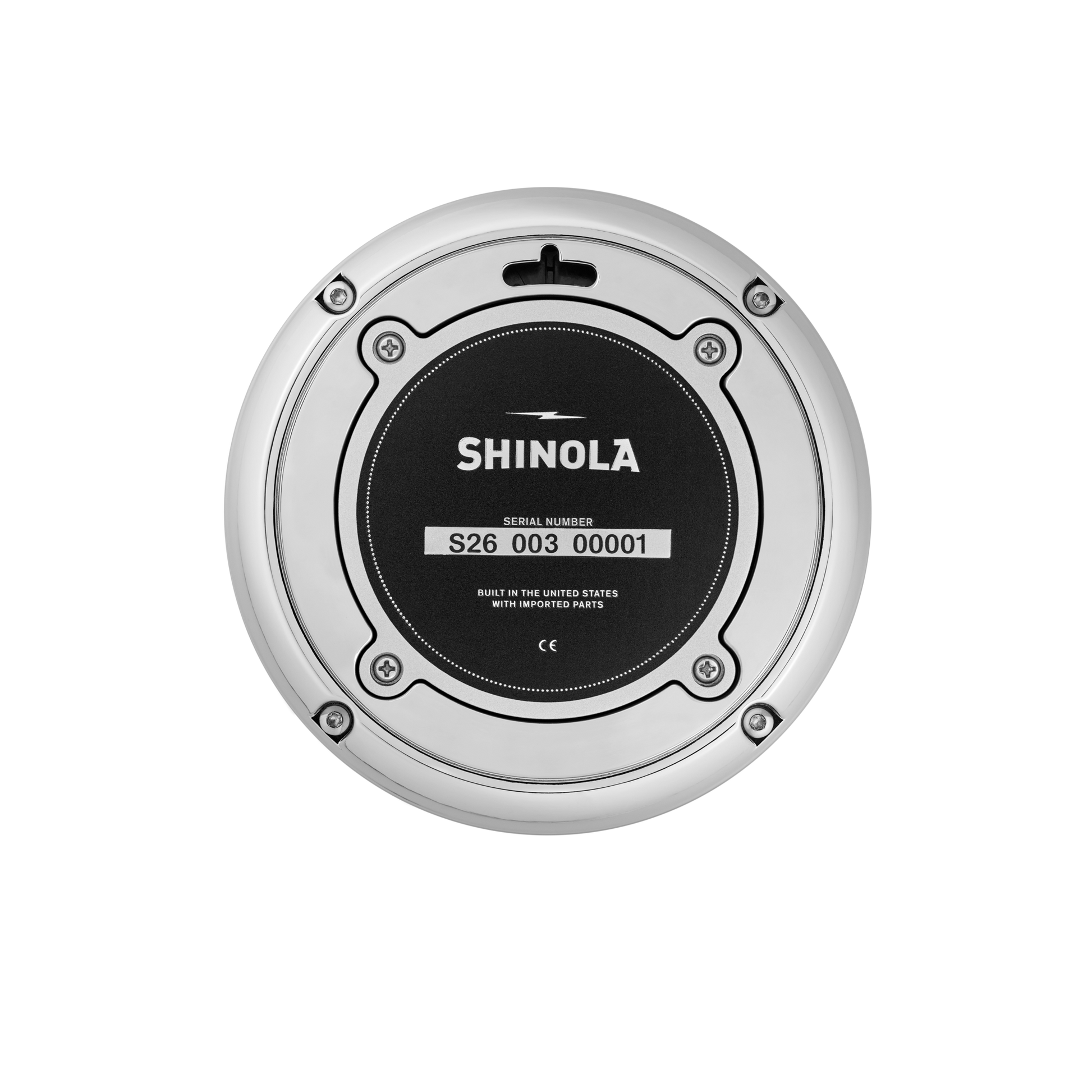 A round, metallic Shinola 6" Runwell Clock – Blue is shown from above, featuring a black center labeled SHINOLA, serial number S26 003 00001, wolverine blue accents, and the text "Built in the United States with imported parts.
