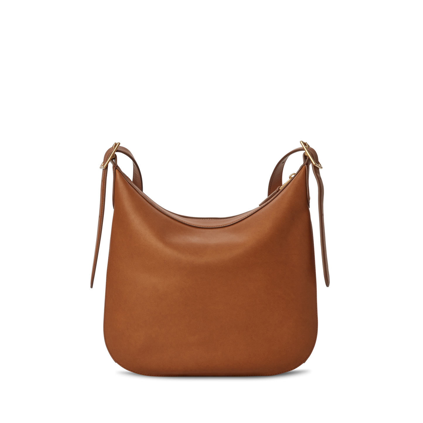 The Shinola Medium Bixby Crossbody - Tan is a minimalist leather shoulder bag with adjustable straps and gold-tone buckles, shown against a white background—a versatile piece for any occasion.