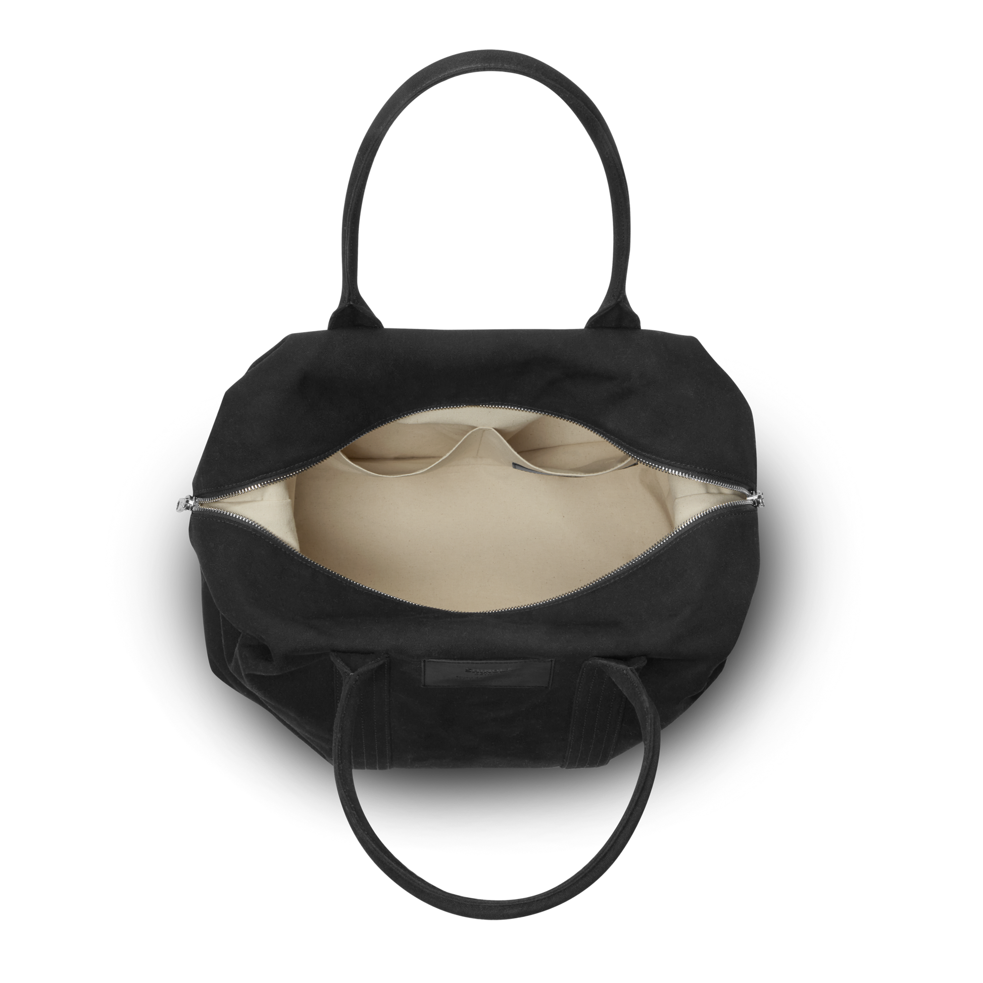 The Shinola Runabout Holdall Canvas Bag - Black is displayed open from above, showing a roomy beige interior with zip closure and inner pockets—ideal as a women’s holdall or chic alternative to a crossbody bag.