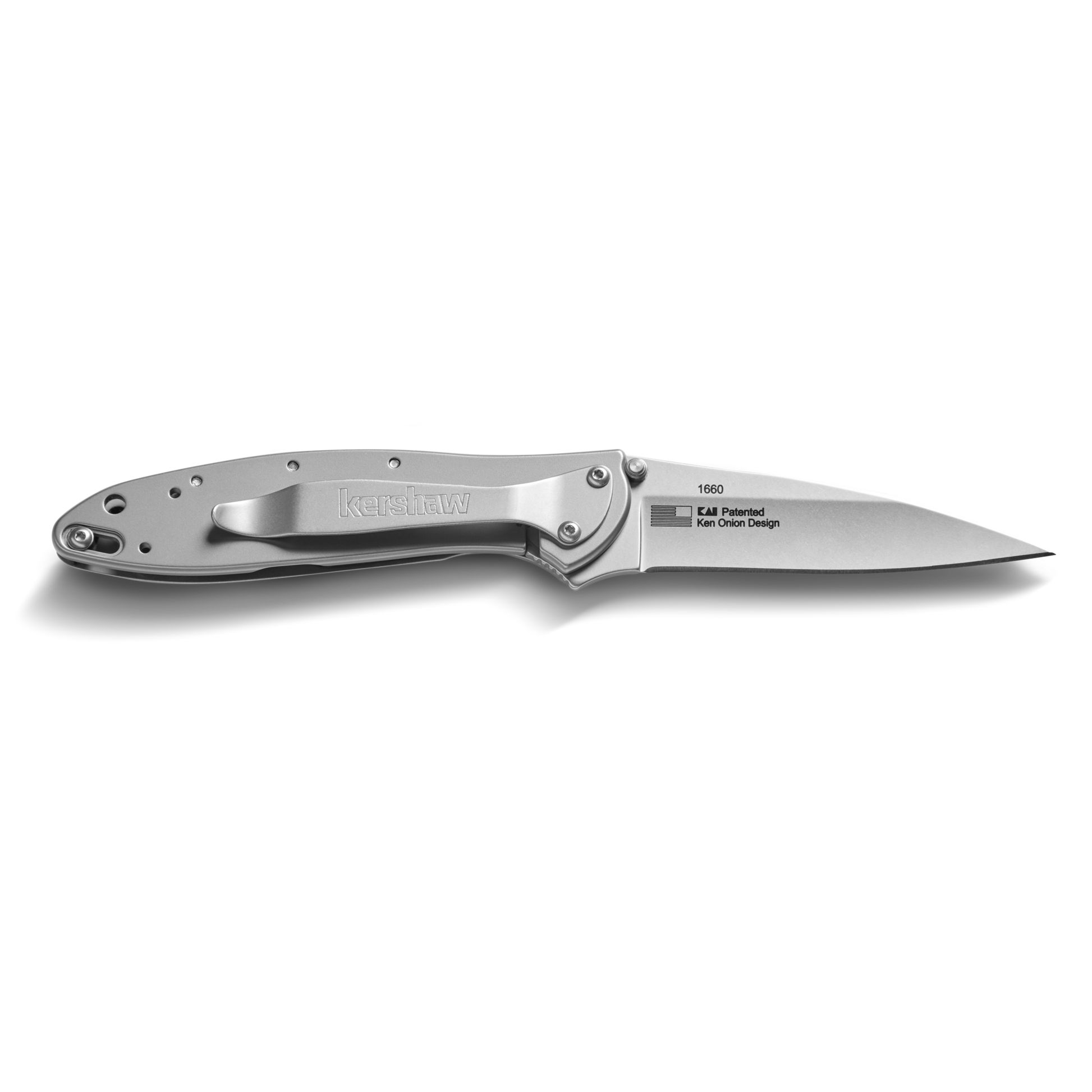 The Shinola + Kershaw Petoskey Stone Pocket Knife - Petoskey features a stainless steel folding blade, minimalist design, visible hinge screws, and a unique Petoskey Stone handle, shown on a plain white background.